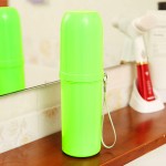 Cylindrical toothbrush holder for travel, green color